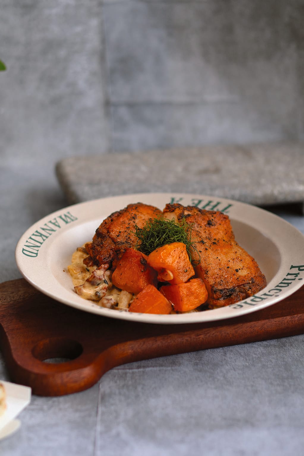 Cajun-Spiced Pan-seared Chicken Chop on a Principle plate
