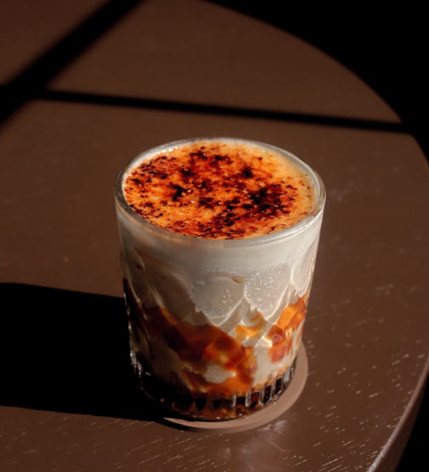 Crème brûlée latte with a torched sugar top, Principle Reserve
